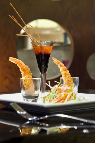 Imagen del bar/restaurante del Hotel Mercure Gold Al Mina Road Dubai. Foto 6