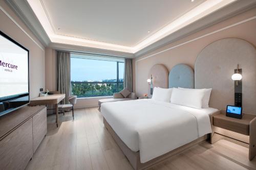 Imagen de la habitación del Hotel Mercure Guangzhou Baiyun International Airport. Foto 17