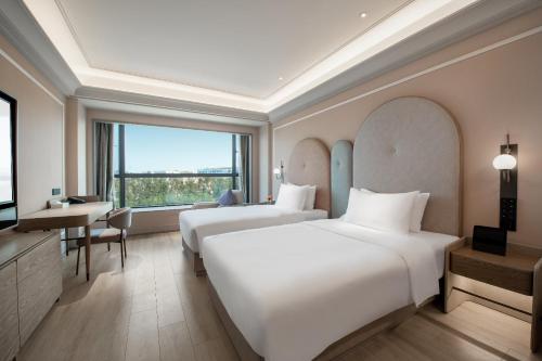 Imagen de la habitación del Hotel Mercure Guangzhou Baiyun International Airport. Foto 20