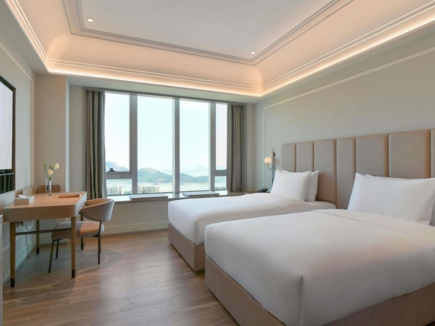 Imagen de la habitación del Hotel Mercure Guangzhou Nansha. Foto 6