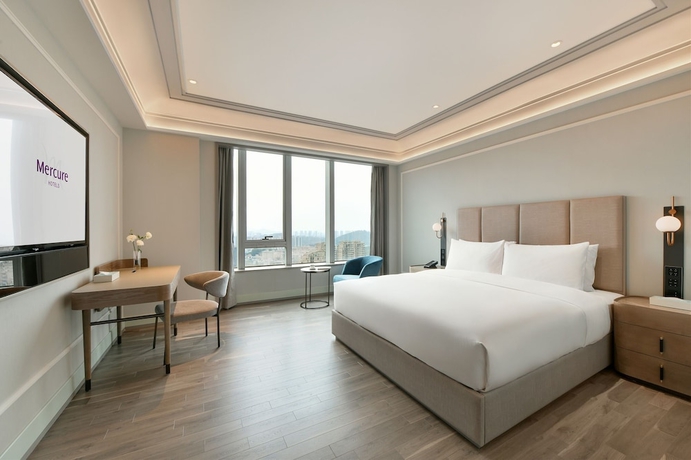 Imagen de la habitación del Hotel Mercure Guangzhou Nansha. Foto 15