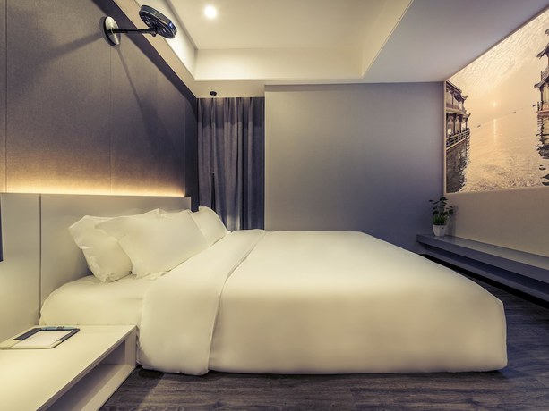 Imagen de la habitación del Hotel Mercure Hangzhou Qianjiang. Foto 8