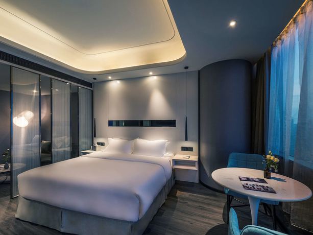 Imagen de la habitación del Hotel Mercure Hangzhou Qianjiang. Foto 12