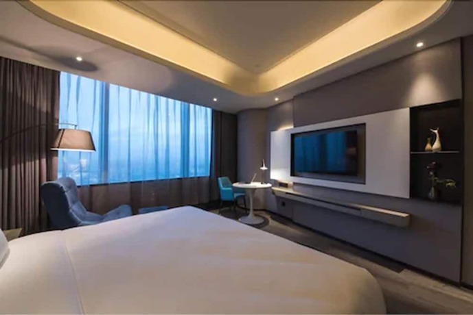 Imagen de la habitación del Hotel Mercure Hangzhou Qianjiang. Foto 16