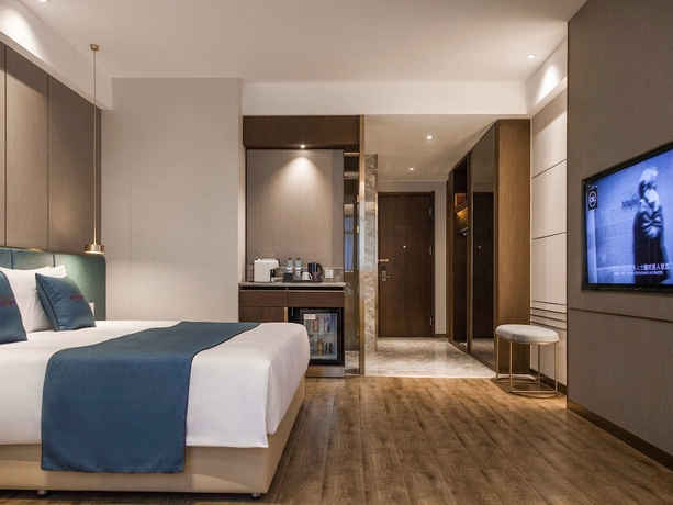 Imagen de la habitación del Hotel Mercure Harbin Songbei. Foto 2