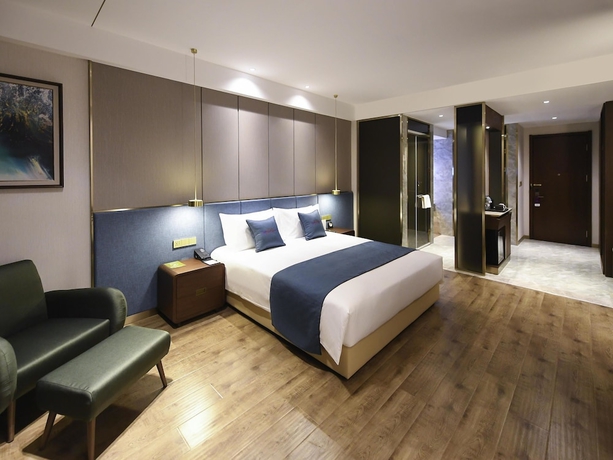 Imagen de la habitación del Hotel Mercure Harbin Songbei. Foto 4