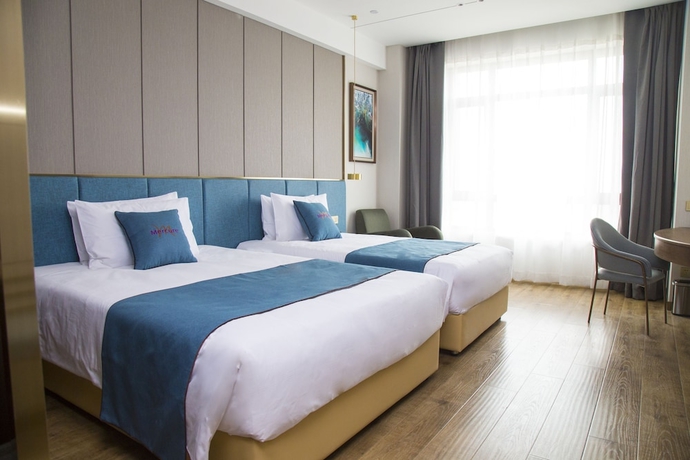 Imagen de la habitación del Hotel Mercure Harbin Songbei. Foto 8