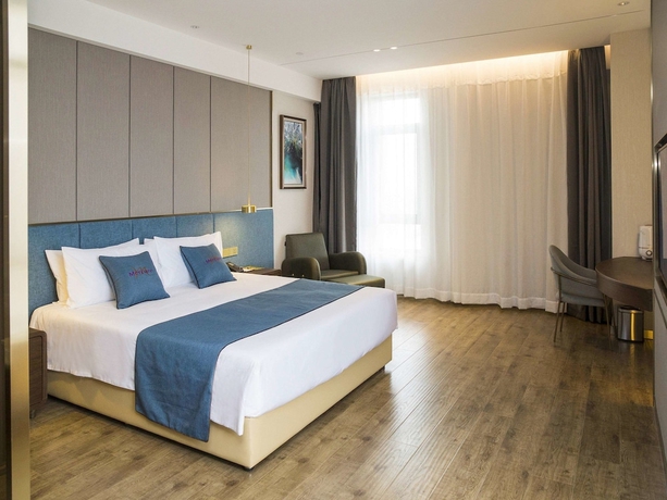 Imagen de la habitación del Hotel Mercure Harbin Songbei. Foto 12
