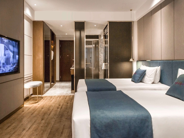 Imagen de la habitación del Hotel Mercure Harbin Songbei. Foto 17