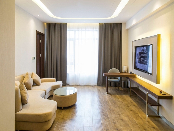 Imagen de la habitación del Hotel Mercure Harbin Songbei. Foto 18