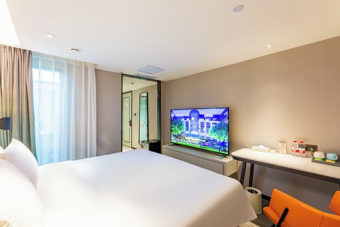 Imagen de la habitación del Hotel Mercure Harbin West Railway Station. Foto 13