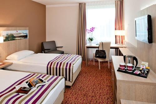 Imagen de la habitación del Hotel Mercure Hotel Hamburg am Volkspark. Foto 16