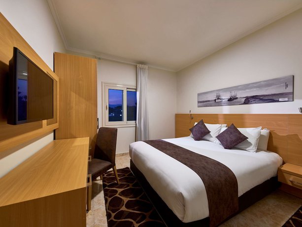 Imagen de la habitación del Hotel Mercure Ismailia Forsan Island, Ismailia. Foto 13