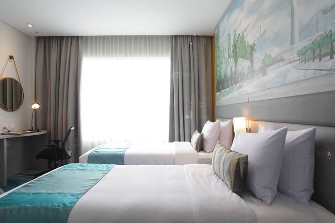Imagen de la habitación del Hotel Mercure Jakarta Cikini. Foto 3
