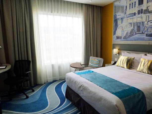 Imagen de la habitación del Hotel Mercure Jakarta Cikini. Foto 12