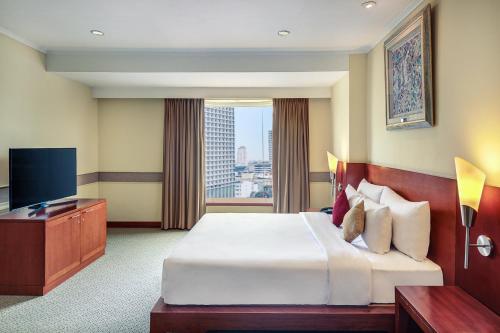 Imagen de la habitación del Hotel Mercure Jakarta Kota. Foto 7