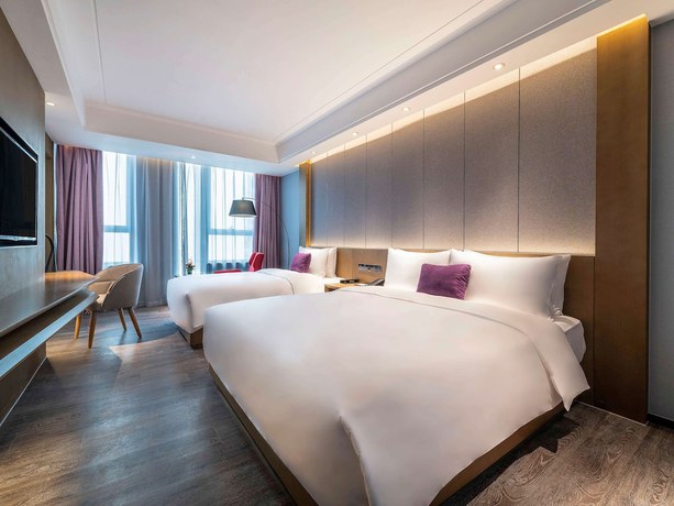 Imagen de la habitación del Hotel Mercure Kunshan Mixc Hi-tech. Foto 8