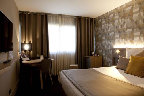 Imagen de la habitación del Hotel Mercure Lyon Charbonnieres. Foto 2