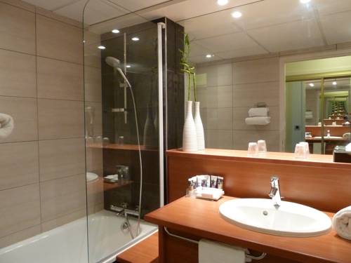 Imagen de la habitación del Hotel Mercure Lyon Charbonnieres. Foto 11