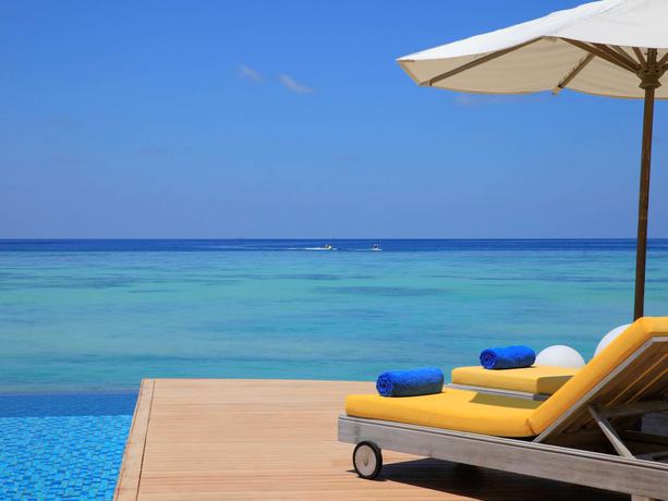 Imagen de la habitación del Hotel Mercure Maldives Kooddoo Resort. Foto 14