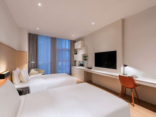 Imagen de la habitación del Hotel Mercure Nanjing Olympic Expo. Foto 9