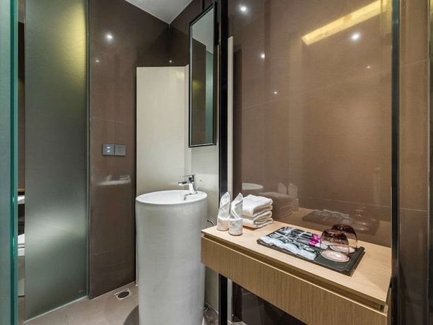 Imagen de la habitación del Hotel Mercure Nanjing Olympic Expo. Foto 12