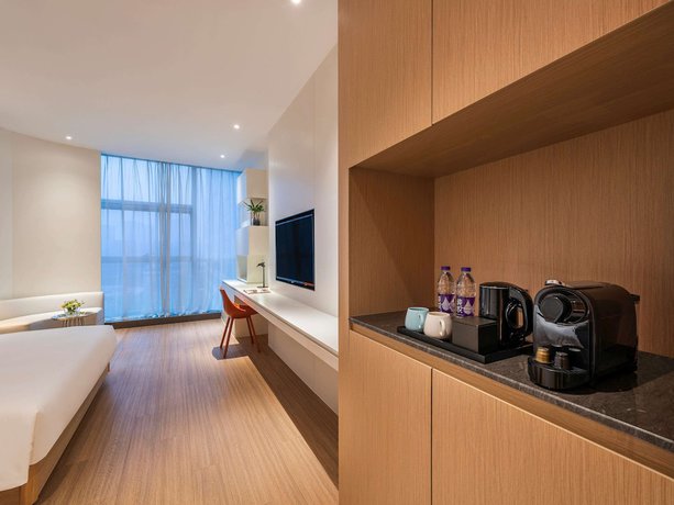 Imagen de la habitación del Hotel Mercure Nanjing Olympic Expo. Foto 17