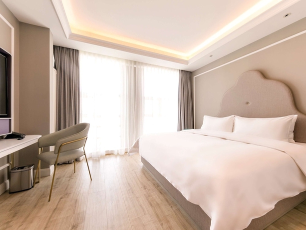 Imagen de la habitación del Hotel Mercure Ordos Downtown. Foto 9