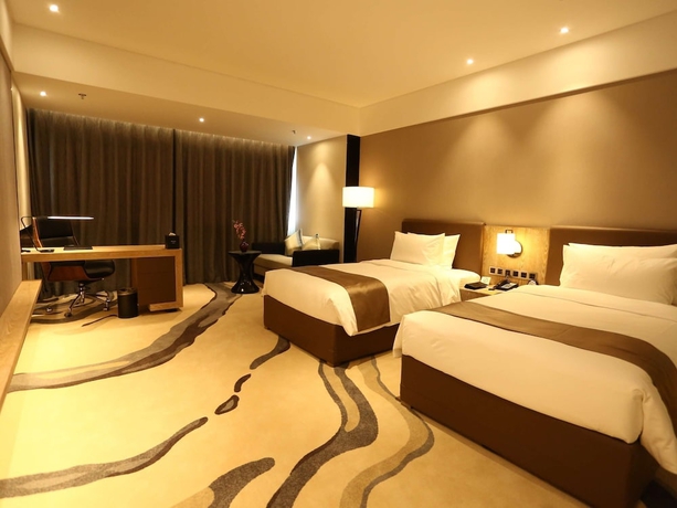 Imagen de la habitación del Hotel Mercure Panjin. Foto 17