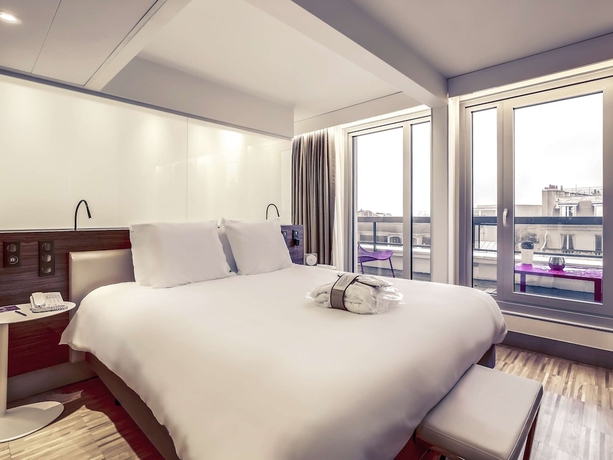 Imagen de la habitación del Hotel Mercure Paris Arc De Triomphe Etoile. Foto 8