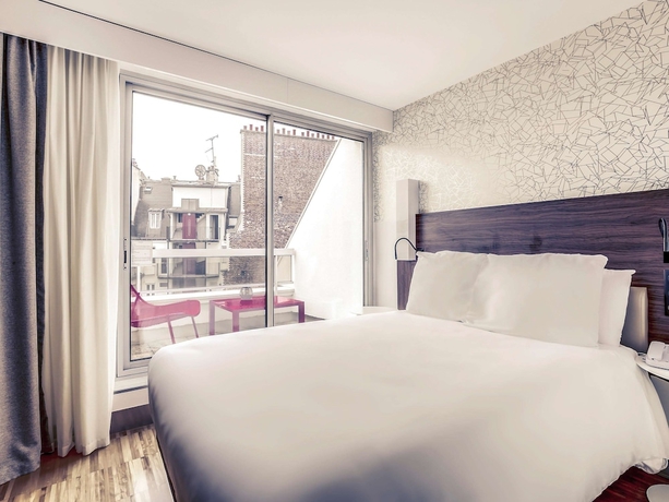 Imagen de la habitación del Hotel Mercure Paris Arc De Triomphe Etoile. Foto 9