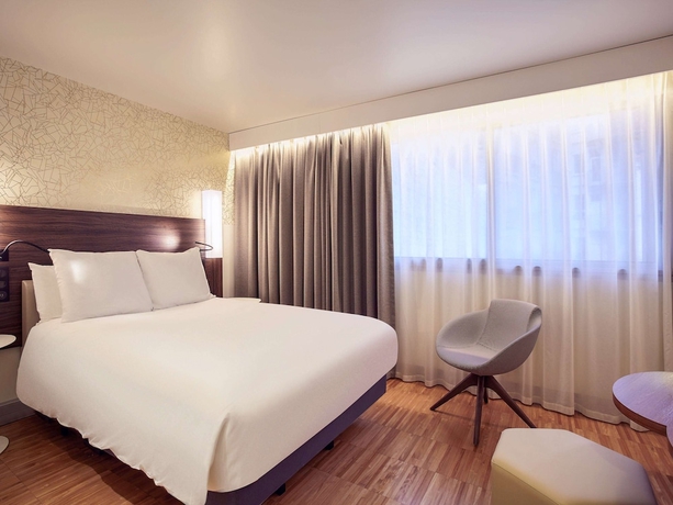Imagen de la habitación del Hotel Mercure Paris Arc De Triomphe Etoile. Foto 11