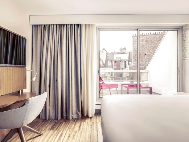 Imagen de la habitación del Hotel Mercure Paris Arc De Triomphe Etoile. Foto 12