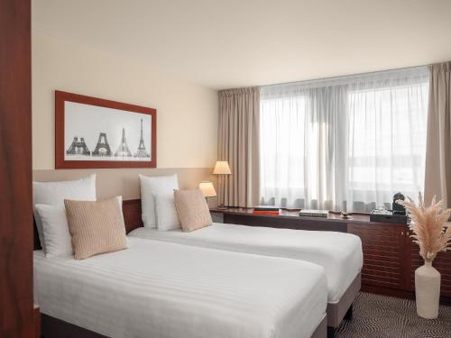 Imagen de la habitación del Hotel Mercure Paris Gare Montparnasse TGV. Foto 4