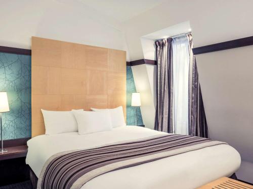 Imagen de la habitación del Hotel Mercure Paris La Sorbonne Saint Germain des Prés. Foto 9