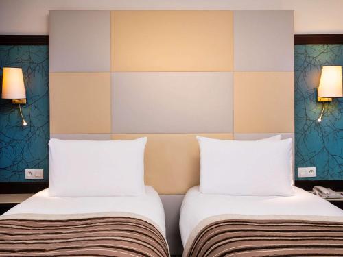 Imagen de la habitación del Hotel Mercure Paris La Sorbonne Saint Germain des Prés. Foto 15