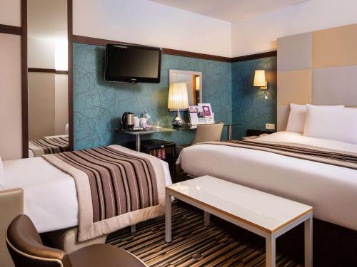 Imagen de la habitación del Hotel Mercure Paris La Sorbonne Saint Germain des Prés. Foto 17