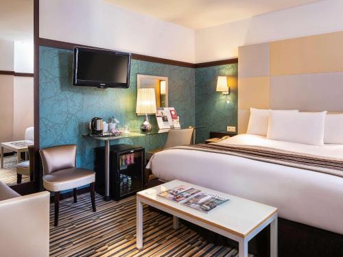 Imagen de la habitación del Hotel Mercure Paris La Sorbonne Saint Germain des Prés. Foto 20