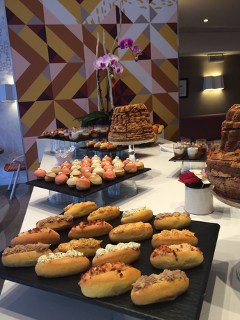 Imagen del bar/restaurante del Hotel Mercure Paris Montmartre Sacré Coeur. Foto 2