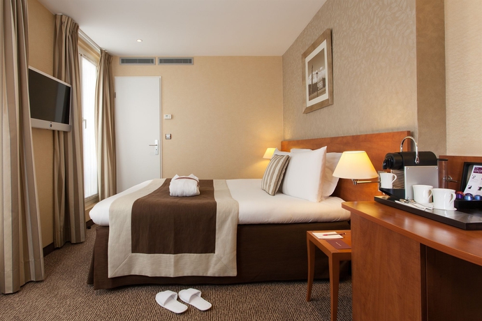 Imagen de la habitación del Hotel Mercure Paris Opéra Garnier. Foto 6