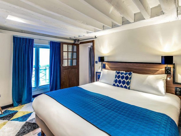 Imagen de la habitación del Hotel Mercure Paris Opera Grands Boulevards. Foto 8