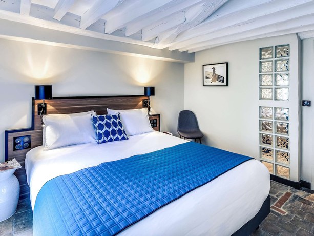 Imagen de la habitación del Hotel Mercure Paris Opera Grands Boulevards. Foto 12