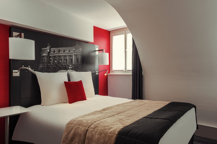 Imagen de la habitación del Hotel Mercure Paris Opera Louvre. Foto 11