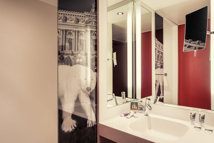 Imagen de la habitación del Hotel Mercure Paris Opera Louvre. Foto 13