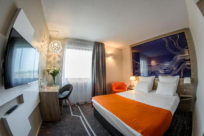 Imagen de la habitación del Hotel Mercure Poitiers Site Du Futuroscope. Foto 7