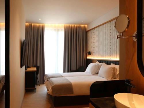Imagen de la habitación del Hotel Mercure Prishtina City. Foto 12