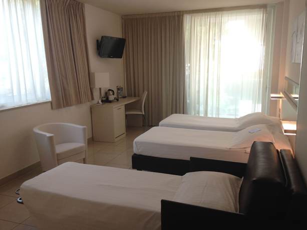 Imagen de la habitación del Hotel Mercure Rimini Artis. Foto 8