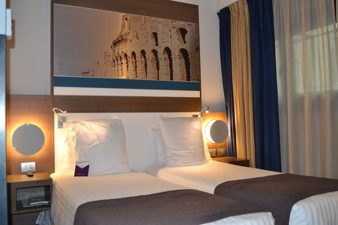 Imagen de la habitación del Hotel Mercure Roma Centro Colosseo. Foto 11