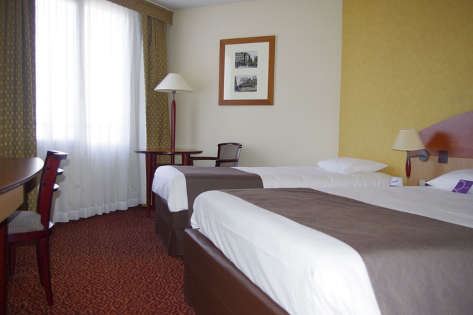 Imagen de la habitación del Hotel Mercure Saint Etienne Parc de l'Europe. Foto 7