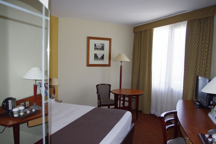 Imagen de la habitación del Hotel Mercure Saint Etienne Parc de l'Europe. Foto 8